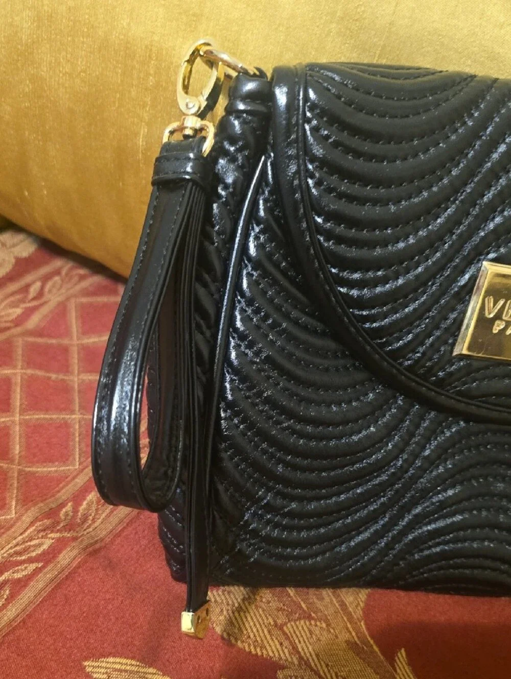 Versace sleek wristlet